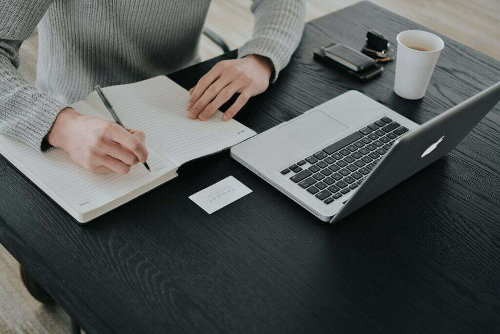 Taking notes on a notebook
