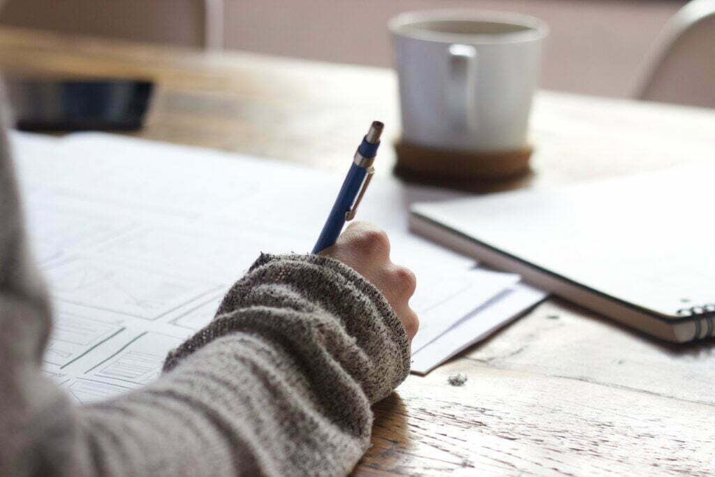 Writing notes down on paper