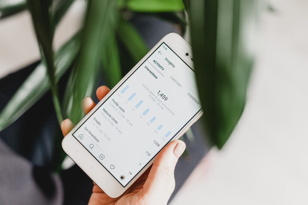 Phone screen displaying social ad insights
