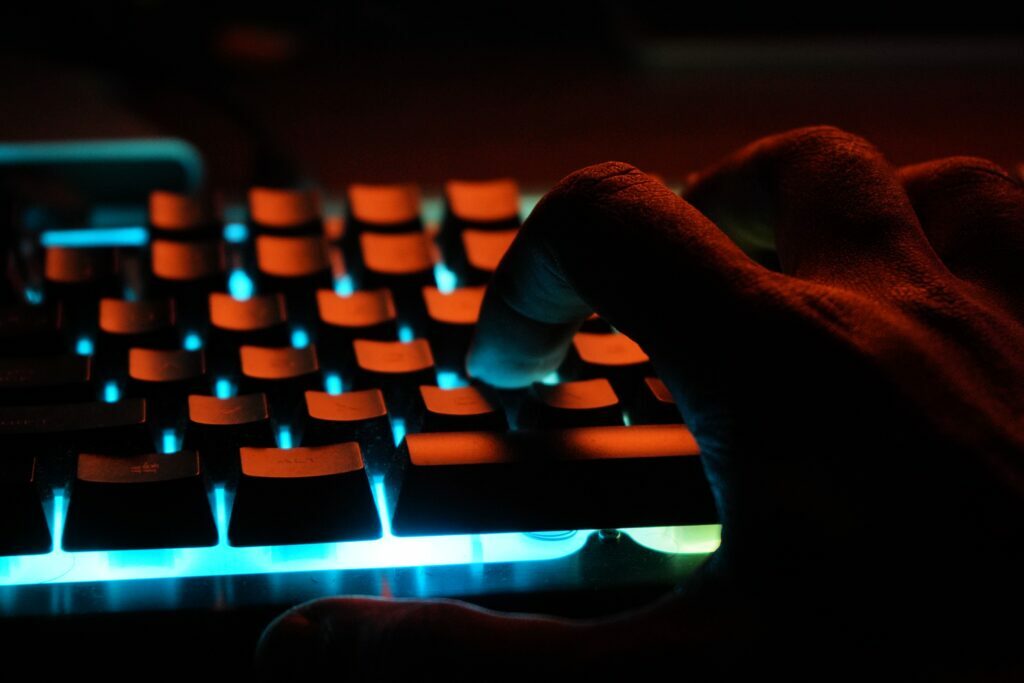 Hand typing on a keyboard